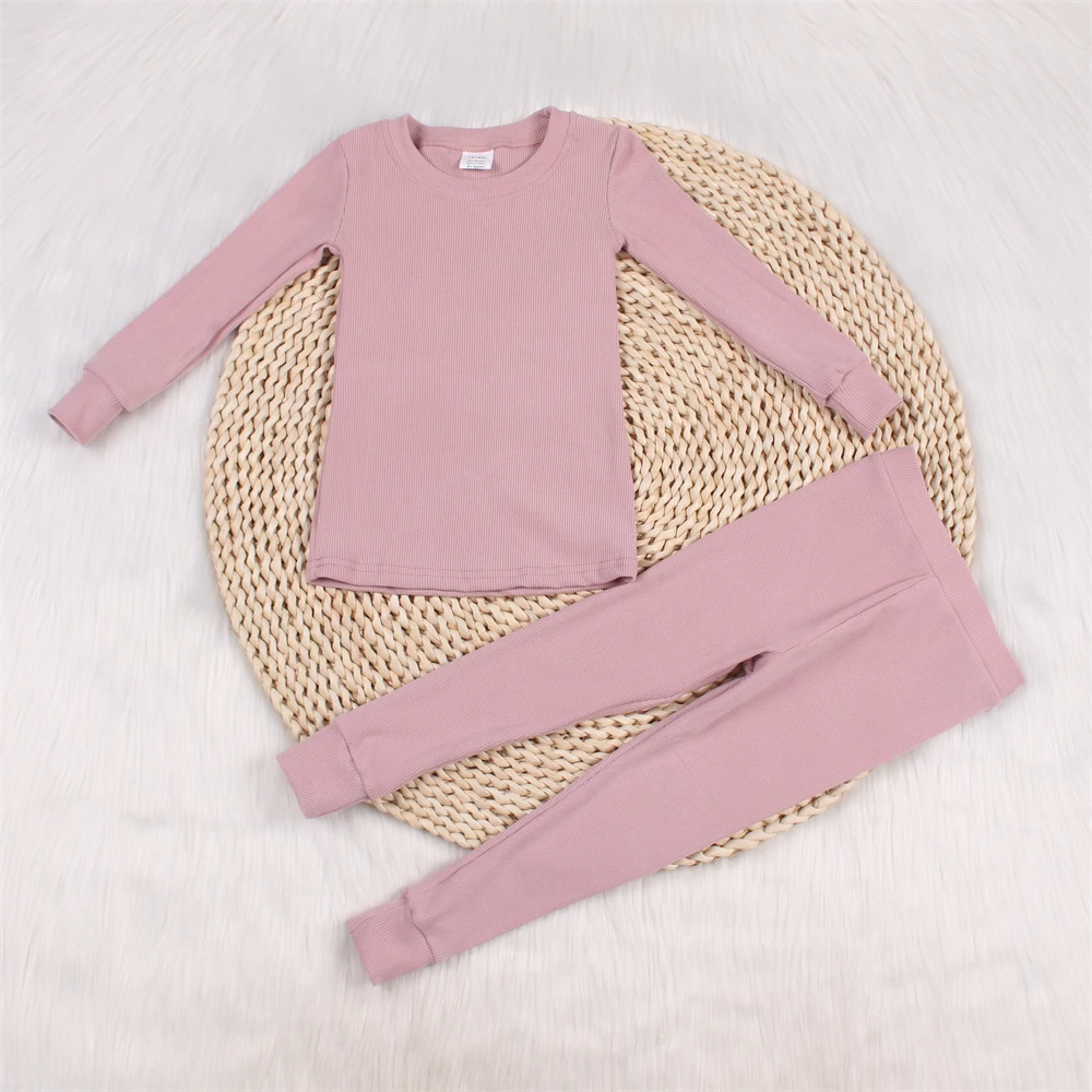 Wholesale bow Christmas bamboo/spandex pajamas - soft, eco-friendly holiday sleepwear for businesses seeking premium, sustainable apparel options.