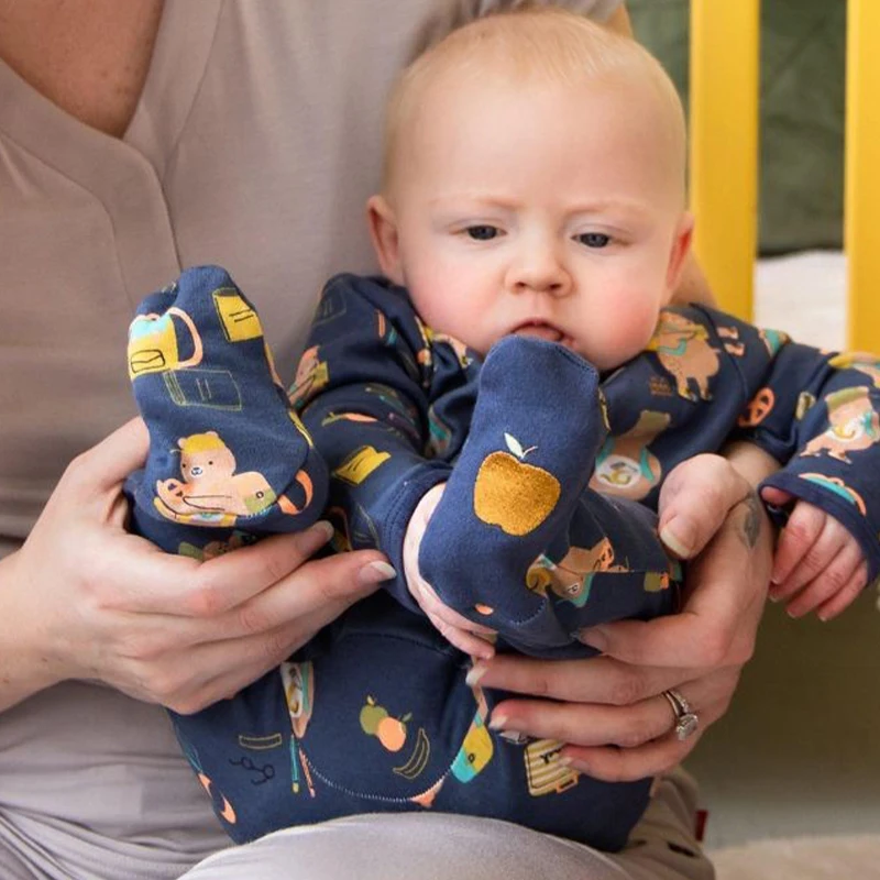 Adorable ruffle baby romper in premium fabric, perfect for B2B wholesale buyers seeking stylish and high-quality infant apparel.