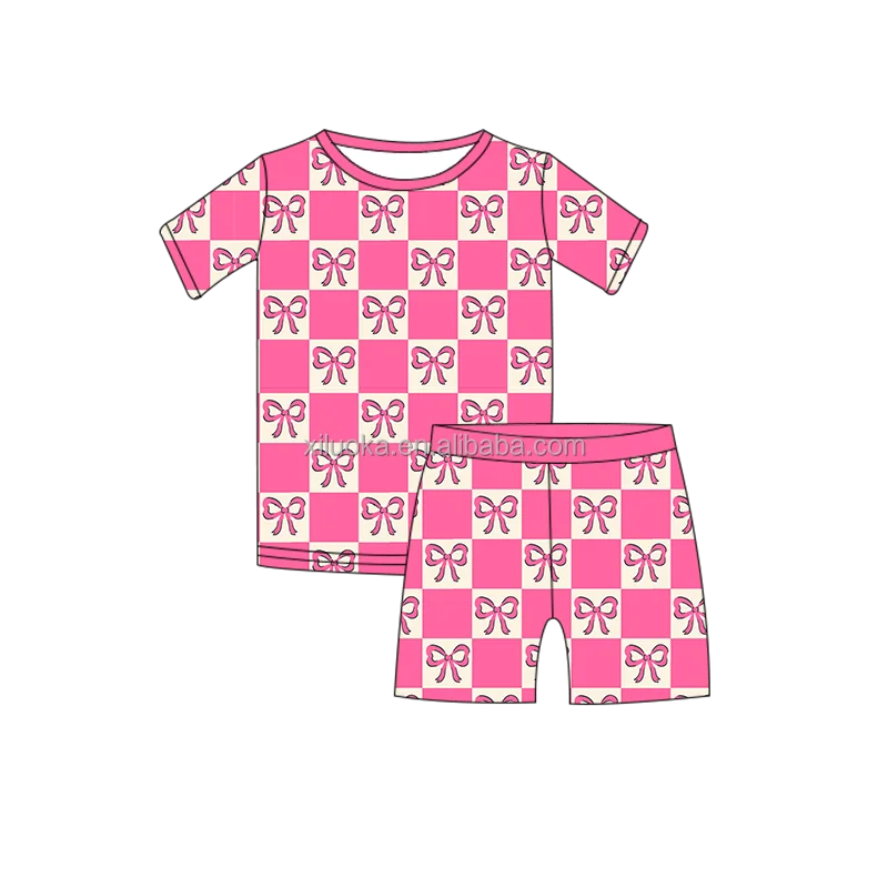 Soft bamboo pajamas for baby girls displayed neatly, ideal for B2B wholesale buyers seeking sustainable and premium baby clothing options.