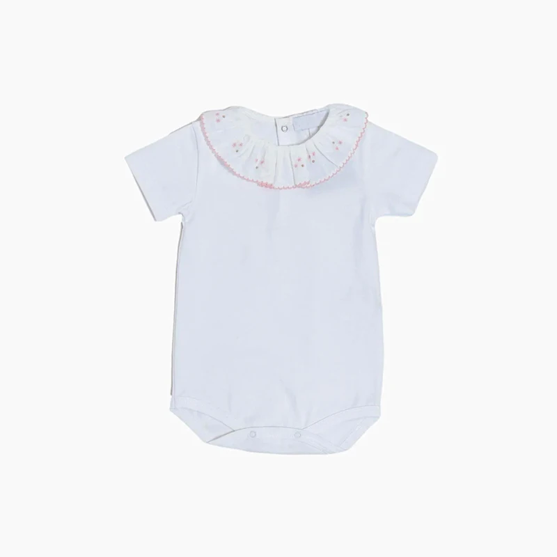 Adorable western sleeper baby in cozy outfit, ideal for B2B wholesale baby clothing retailers seeking high-quality, stylish inventory.
