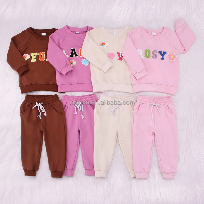 Festive adult Christmas pajamas with a Western theme, ideal for B2B wholesale buyers seeking seasonal apparel for retail stores.