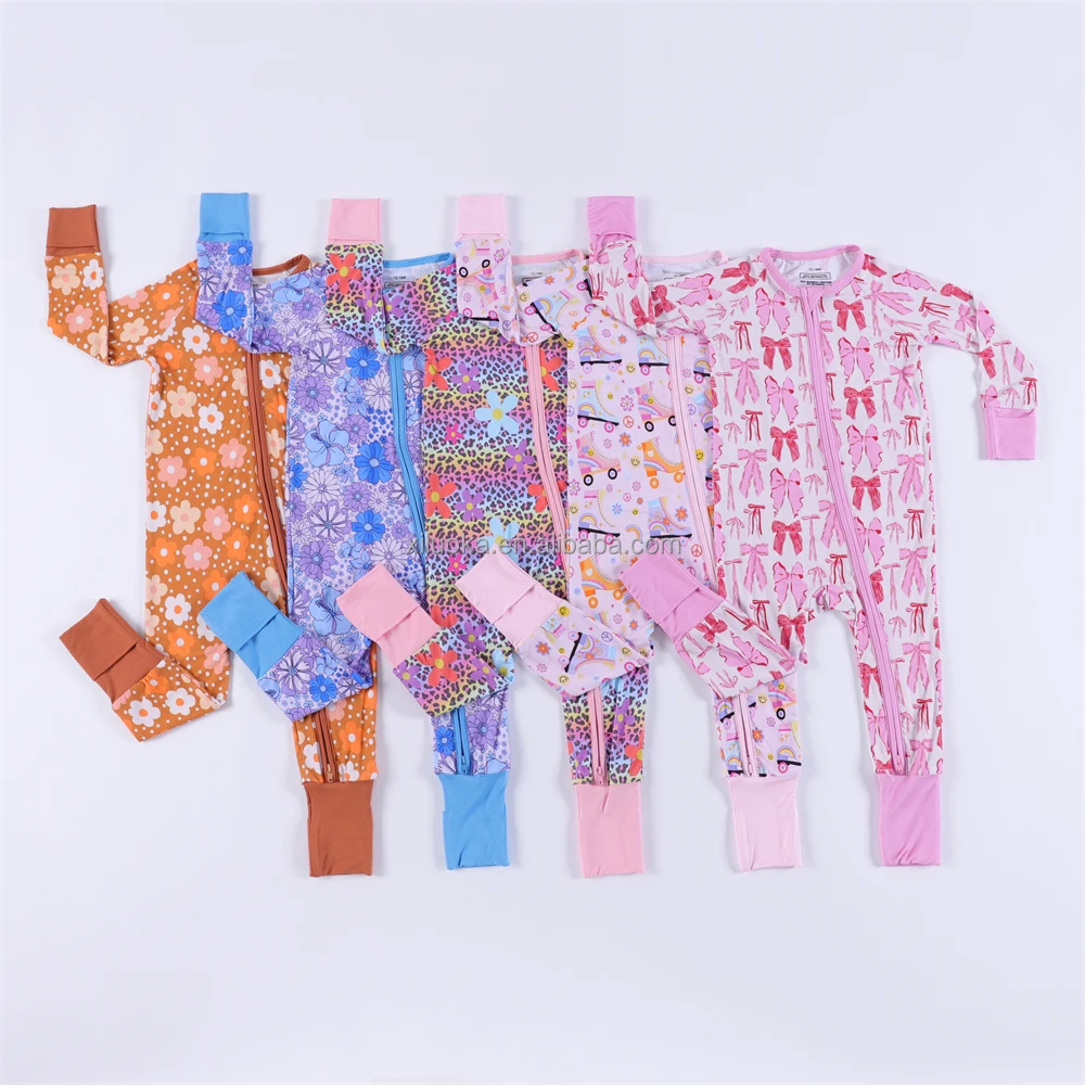 Soft bamboo baby sleeper in neutral tones, ideal for eco-friendly wholesale baby apparel businesses seeking sustainable, high-quality products.